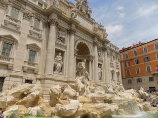 Fototapeta na wymiar The Famous Marble Trevi Fountain in Rome Italy with Intricate Classic Carvings and Sculptures
