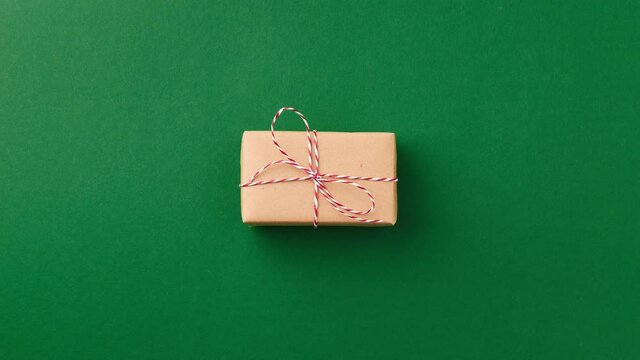 Stop motion animation with Christmas New year gift boxes change on green background