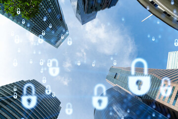 Hologram padlock icons symbolize the business protection in Asia over low angle shot of Singapore skyscrapers. The concept of information security shields. Double exposure.