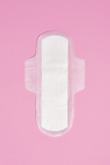 cotton sanitary pad napkin on pink background