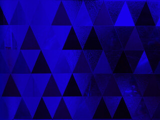 Fototapeta premium Abstract blurred blue geometric background.