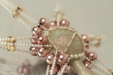 silver-gold Christmas ornament with corals