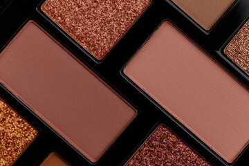 A palette of makeup shadows as an abstract background. MUA and girly concept. Luxury Eyeshadow palette, cosmetics product as luxury beauty brand promotion. Contouring makeup palette close up
