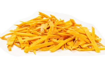 Dry tasty mango slices as a background.