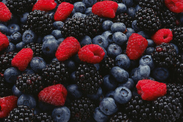 Blackberry, raspberry, blueberry background.  Top view.
