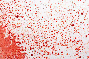 bloody drops on a white background texture. bubbles in red water