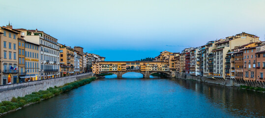 Obraz premium Sunset on Ponte Vecchio - Old Bridge - in Florence, Italy. Amazing blue light before the evening.