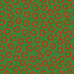 Seamless pattern with Christmas decoration. Red circles on green pattern.