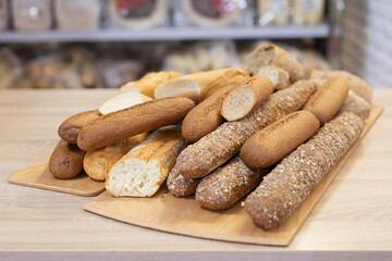Various types of Baguettes Placed on a Wooden Tray