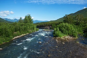 A river under the Vilyuchinsky stratovolcano (Vilyuchik) in the southern part of the Kamchatka Peninsula, Russia.