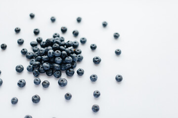 A bunch of ripe, beautiful blueberries, blueberries close-up on a white background. Healthy food, and vitamins.