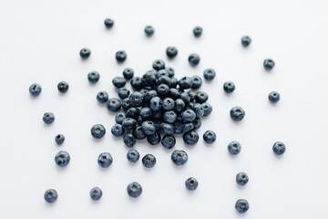 A bunch of ripe, beautiful blueberries, blueberries close-up on a white background. Healthy food, and vitamins.