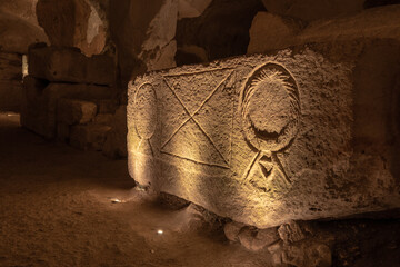 Carved sarcophagus with beautiful designs in the Cave of the Coffins at Bet She'arim in Kiryat...