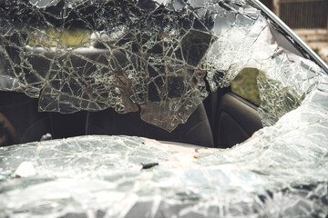  broken car windshield. car after the accident. vandalism