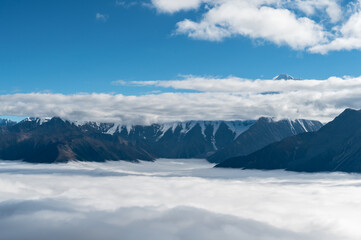 Naklejka na ściany i meble Plateau natural scenery, Gongga Snow Mountain in the sea of clouds