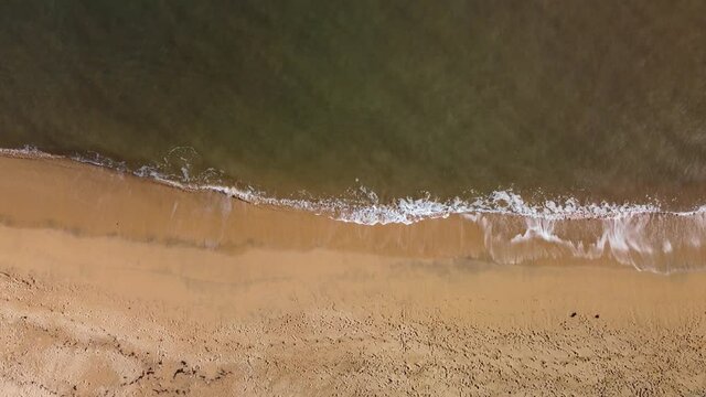 Aerial view seashore and breaking waves in Asturias, Spain.