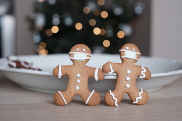 christmas gingerbread people wear masks after the second vaccination, Christmas during the epidemic