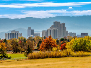 Fototapeta premium City of Reno downtown skyline cityscape with Hotels, Casinos and skyscrapers during Autumn with vibrant colored trees.