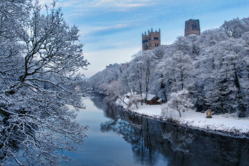 Durham Cathedral Towering over the River Wear with Frozen Trees. Durham City, County Durham England, UK.