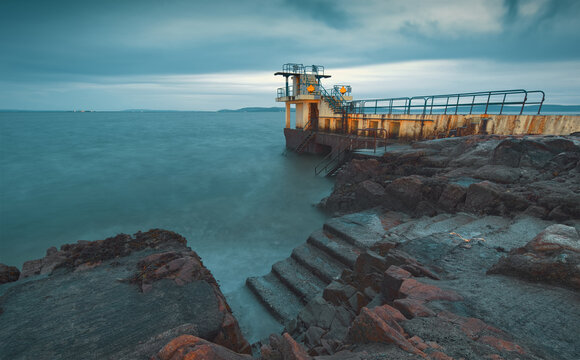 Evening scenery of Blacrock diving tower by the Atlantic ocean on Salthill beach in Galway city, Ireland 