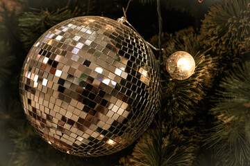 New Year, Christmas, winter holidays festive background. Christmas tree with gold decorations, toys. Beautiful Chrisrmas interior in golden colors.