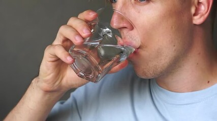 Young Man taking medicine for flu influenza, painkiller, vitamin complex from Erectile Dysfunction viagra antidepressant or antibiotic medicine for colds or flu emergency treatment having depression