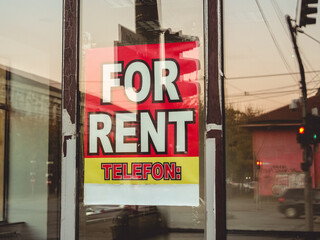 For Rent Text on Store Front Window 