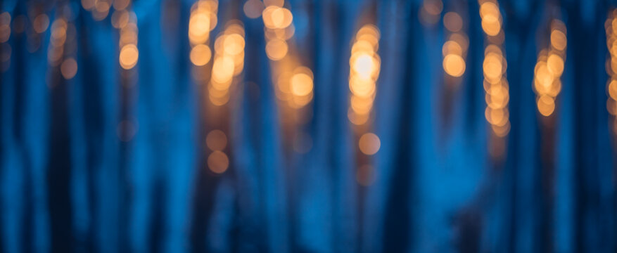 Defocused blue background with warm color bokeh lights