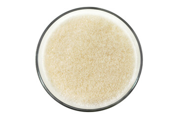 Bowl, plate with free-flowing sugar close-up on a white background. Granulated Sugar Isolate