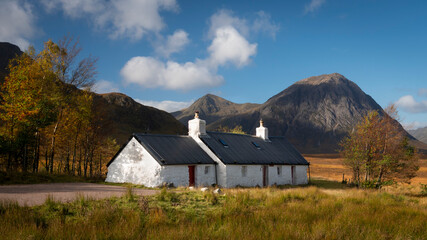 Old white cottage sits in the Scottish Highlands at the foot of Buachaille Etive Mor in Glencoe. © Sharon