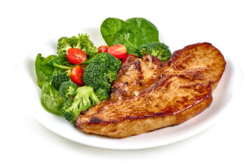 Roasted pork steaks with vegetable salad, isolated on white background.