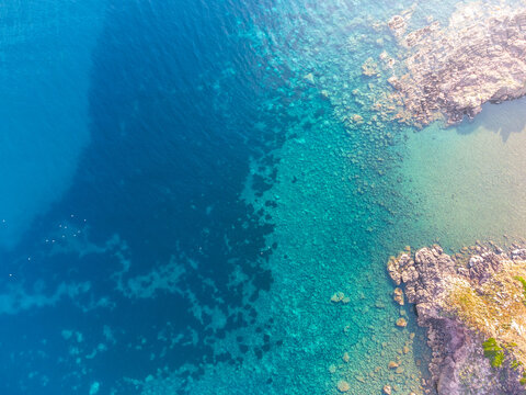 Turquoise water in Mannu river outlet seen from above © Gabriele Maltinti