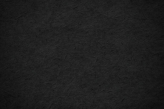 abstract black paper texture. dark blank wallpaper