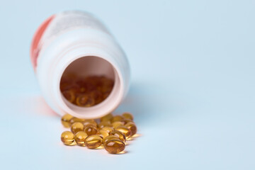 Omega 3 capsules on a light background