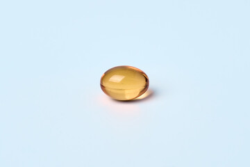 Omega 3 capsules on a light background