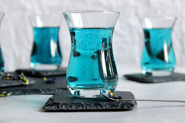 Healthy drinks, organic blue butterfly pea flower tea background copy space top view