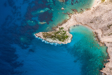 Fototapeta na wymiar Aerial photo of rock formation at the exotic sea of Petani beach at Kefalonia island Greece