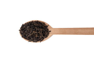 yunnan black tea on wooden spoon isolated on white background.