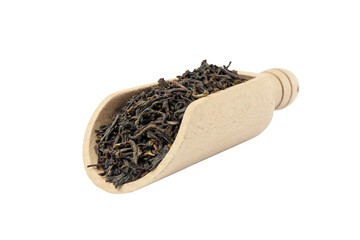 yunnan black tea in wooden scoop isolated on white background.