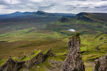 Fototapeta na wymiar Aerial view of spectacular jagged rock formations at a remote, highlands location (Quiraing, Isle of Skye)