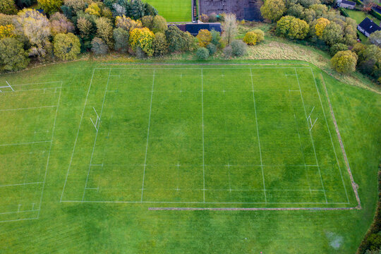 Aerial view of a fully marked Rugby Union pitch surrounded by trees in Autumn colours (Ebbw Vale, Wales)
