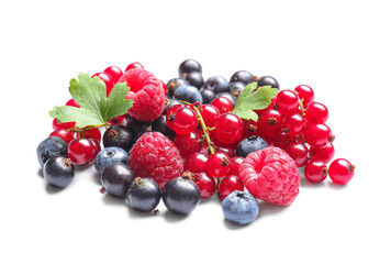 Tasty different berries on white background
