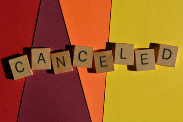 Canceled, word in wooden letters isolated on background