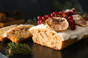 Fototapeta na wymiar Board with tasty Christmas bread on table