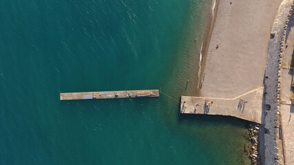 Aerial photo of floating pier next to venetian port of Nafpaktos in West Greece