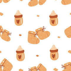 Baby seamless pattern with booties and baby bottle.