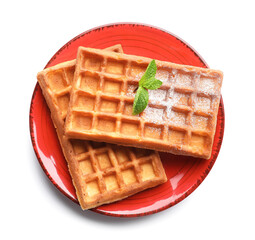 Plate with tasty Belgian waffles and mint on white background