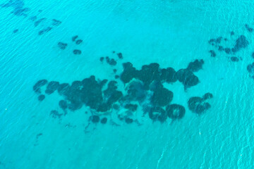 Fototapeta na wymiar Aerial photo of turquoise sea and reef of Louros beach in West Greece