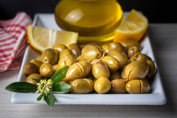 Cracked green olives. Cracked green olives with lemon. Turkish style olive (Turkish name; kirma zeytin)