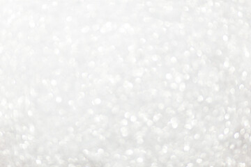 Defocused christmas or party, grey glitter background with bokeh. Holiday glowing backdrop,banner...